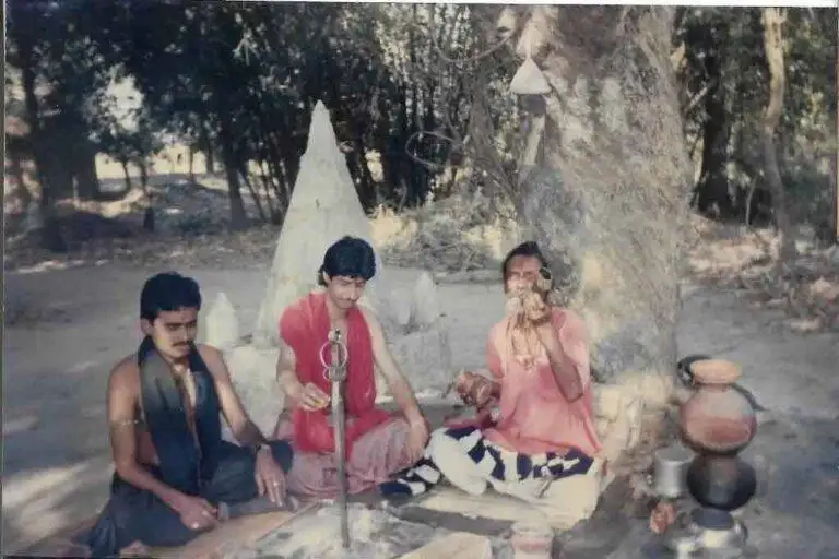 I'm with Tantrik Probir Acharaya ( Deb Shastri) in a special ritual... in Kankalitala shamshan ghat 1999