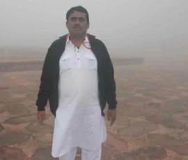 Ramapada Acharjee amidst the mystical mist of a high-altitude spiritual retreat