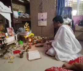 Ramapada Acharjee performing daily spiritual rituals and puja for peace and well-being