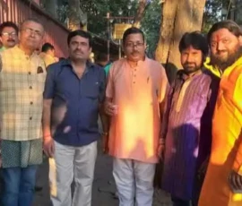 Ramapada Acharjee with professional colleagues and spiritual practitioners during a cultural gathering
