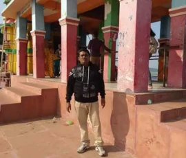Ramapada Acharjee at a historic temple complex during his spiritual exploration tour