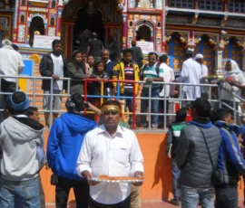 Ramapada Acharjee offering prayers at the holy Badrinath Temple during his 2014 pilgrimage